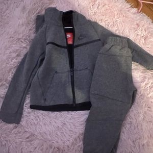 Children’s gray Nike tech suit